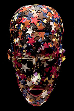 Les cent masques africains de l'artiste Alexandre Ganglo